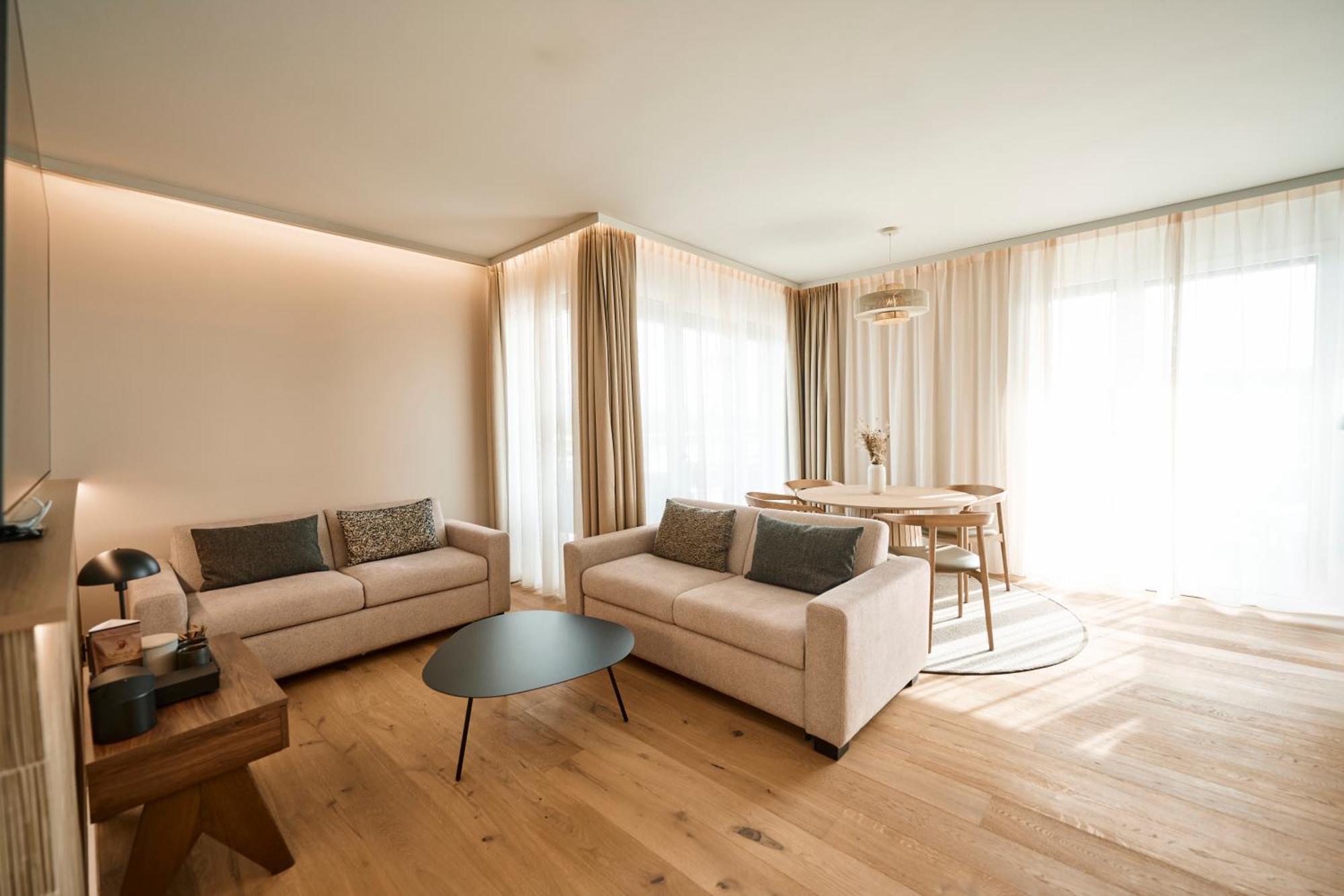 Nouri Hotel Bad Krozingen Room photo A living room in a serviced apartment in Munich, Germany